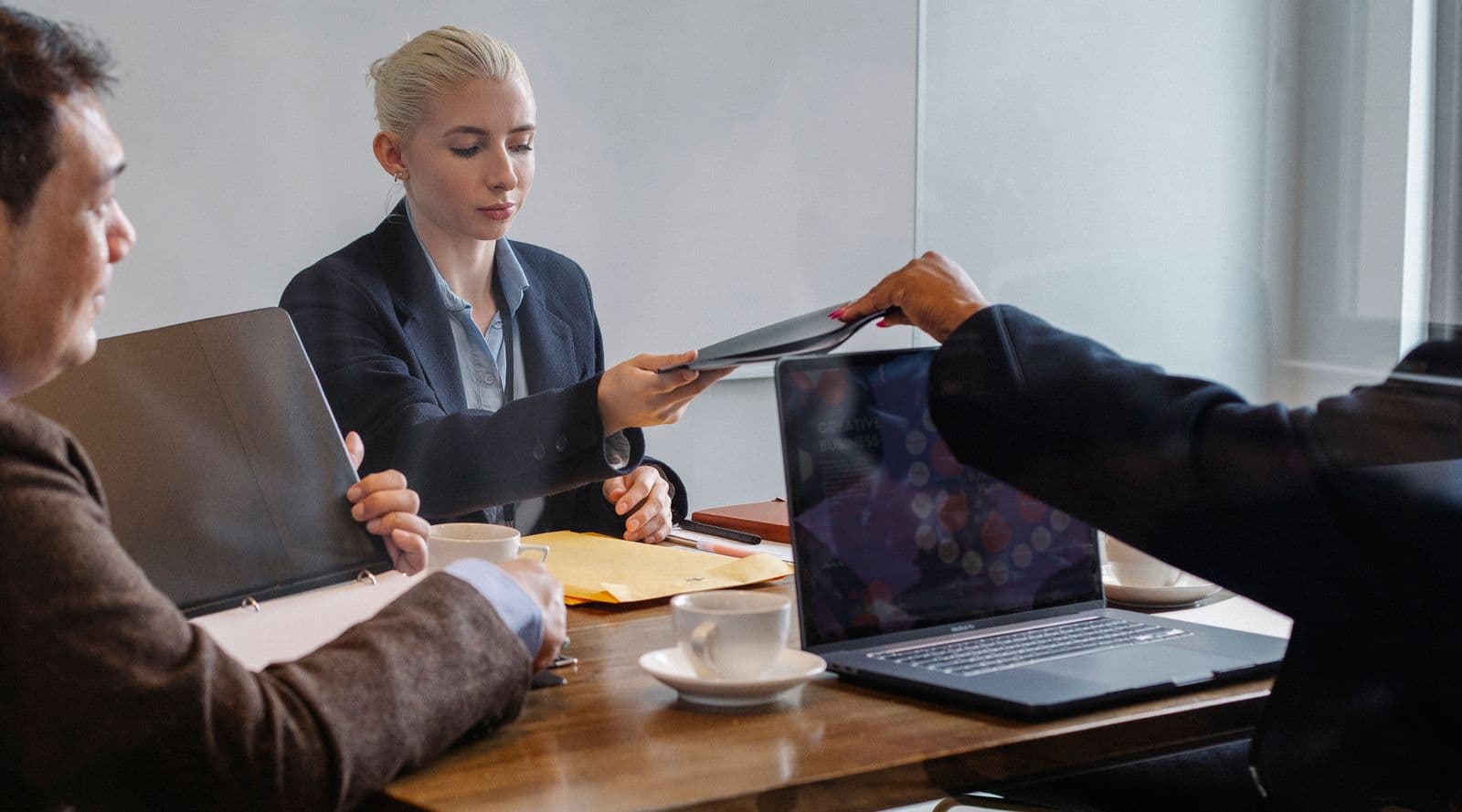 Illustrative photo of a team reviewing implementation documents together